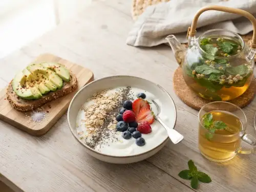 A light breakfast with fruit and herbal tea on a table